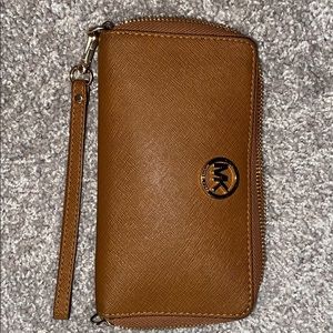 Used, good condition Michael Kors wallet/wristlet.